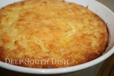 a close up of a cake in a white bowl on a table with the words deep south dish written above it