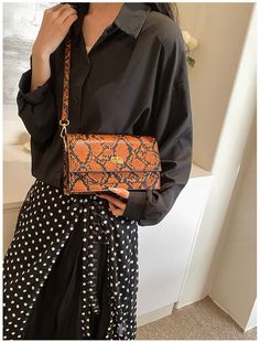 DETAILS Snake print Locks Rectangular:3.9'' W x7.1" H x 11" L Round:3.5''W x 5.9" H x 7.1" L Orange Rectangular Shoulder Bag For Fall, Trendy Rectangular Baguette Bag For Fall, Rectangular Mobile Phone Box Bag For Fall, Rectangular Phone Bag For Fall Travel, Rectangular Fall Phone Bag With Cell Phone Pocket, Rectangular Fall Travel Phone Bag, Rectangular Phone Bag For Travel In Fall, Rectangular Travel Phone Bag For Fall, Trendy Rectangular Phone Bag For Fall