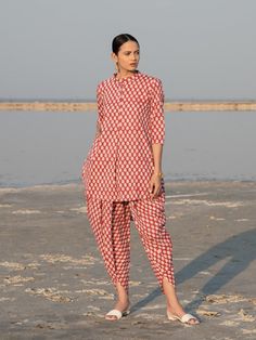 Red Lotus Dhoti Co-Ord Set (Set of 2) By Marche now available at Trendroots Co Ords Outfits Indian, Co Ords Outfits, Red Lotus, Dhoti Pants, Kurta Neck Design, Floral Print Tunic, Cotton Kurti Designs, Kurti Neck Designs, Lotus Design