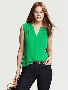 Shirred Sleeveless Top Trendy Sleeveless Tops For Workwear, Stretch Tank Top For Workwear, Sleeveless Buttoned Tops For Work, Sleeveless Stretch Top With Button Closure, Versatile Tank Top For Work, Green Sleeveless Top For Work, Casual Tank Blouse For Work, Sleeveless Tops With Button Closure For Work, Green Sleeveless Buttoned Tank Top