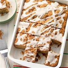 a pan filled with cake and frosting on top of a table