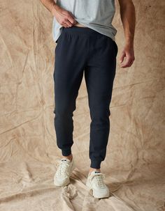 The Normal Brand Puremeso Everyday Jogger' in 'Navy' colour Casual Dress Pants, Henley Sweater, Mens Fall, Mens Joggers, Jogger Sweatpants, Pant Shirt, Travel Outfit, Spandex Fabric, Swimwear Tops