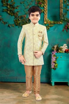 ABOUT THIS ITEM This is an exclusive Bollywood-style Party wears Sherwani Set for little and big boys. Fabric Details: Sherwani, Pajamas are made from Soft Silk, skin-friendly lining for the Kurta The jacket is made with Brocade lining. Occasion: Birthday gift, Festive wear, Kids Diwali wear, Party and Casual wear, Wedding, and all special occasions. Age Group: 1 year - 14 years. Package Includes:  2 pieces ( 1 Sherwani + 1 Pant )   The set includes the hanger and the protective cover  Shipping: Flat shipping rate within the US via USPS. Wash care Instructions: Do not bleach, Iron at low heat, and Dry Clean only. For best fitting, please take measurements for your child and refer to the size chart in the last picture before purchase. This designer wear is made with brocade silk featuring e Gold Sherwani For Navratri Festive Occasion, Gold Sherwani For Navratri Festival, Gold Long Sleeve Sherwani For Navratri, Gold Sherwani With Zari Work For Navratri, Gold Zari Work Sherwani For Navratri, Navratri Gold Sherwani With Zari Work, Traditional Gold Nehru Jacket For Party, Pista Green Sherwani For Navratri Festive Occasion, Fitted Gold Sherwani For Navratri