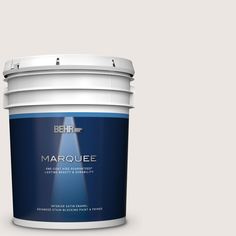 a bucket of marquee paint on a blue background