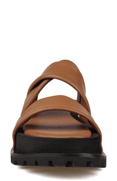 Soft leather straps balance the ridged lug sole on this platform sandal that's water-resistant and ant-slip. 1 3/4" platform Platform sole
 Water-resistant Leather upper and lining/synthetic sole Imported Brown Platform Slides With Round Toe, Brown Synthetic Slide Sport Sandals, Casual Synthetic Sandals With Lug Sole, Synthetic Open Toe Platform Footbed Sandals, Platform Slide Sport Sandals In Synthetic Material, Platform Slide Sport Sandals In Synthetic, Brown Synthetic Platform Footbed Sandals, Synthetic Platform Slide Sport Sandals, Brown Platform Footbed Sandals With Open Toe