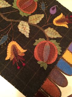 an area rug with leaves and acorns on it