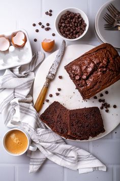 chocolate cake on a plate with coffee and eggs