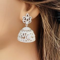 High quality American diamond beautiful jhumka earrings are available in silver and rose gold plating. Perfect for any occasion shagun, jago, sangeet, engagement, pre wedding and parties. Earrings length: 1.10 inches  Earrings width: 1 inches  Care instructions: Avoid Heat and Chemicals like perfume, Deo, Alcohol Etc| clean with Dry Cotton Cloth| Pack in An Air Tight Container After Use. This is handmade jewelry.so color, shade, taxture display may slightly very from the ectual product due to digital imitations. We request you to consider these minor variations.🙏 ✨contact us for any question! Thank you so much for visiting our shop ❤️ Jhumki Earrings, Pakistani Jewelry, India Jewelry, Jewelry Bridal, Jhumka Earrings, Cubic Zirconia Earrings, Zirconia Earrings, Earrings Wedding, American Diamond