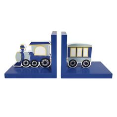 two wooden toy trains sitting on top of each other in front of a white background