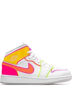 the nike air jordan 1 mid is white, yellow and pink