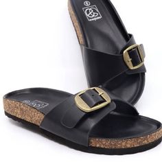 Single band footbed slide sandal with an adjustable buckle. Medium width. True to size. Slide Sandals, Buckle, Sandals, Band, Black