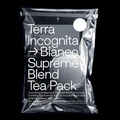 there is a bag of tea on the black background with it's name in white