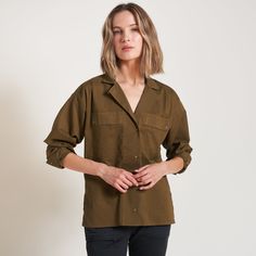 The Fay Boyfriend Shirt is roomy and relaxed but decidedly feminine and sophisticated. Crafted from cotton lawn, a lightweight yet durable fine thread poplin, the Faye has a silky-smooth hand feel. Its unique features include a lay-flat camp collar with an elevated top button and loop closure, wide-set pleated center front placket, and exquisite topstitching details on the sleeve placket and cuff. 100% Cotton Button flap patch pockets at the chest High side-slits at the hem for a fashionable tuc Fall Daywear Blouse With Roll-up Sleeves, Relaxed Fit Blouse With Roll-up Sleeves For Fall, Utility Camp Collar Tops For Workwear, Daywear Blouse With Camp Collar, Spring Long Sleeve Camp Shirt With Pockets, Fall Blouse With Rolled Sleeves And Spread Collar, Relaxed Fit Camp Collar Blouse For Work, Cotton Camp Collar Blouse For Work, Cotton Blouse With Camp Collar For Work