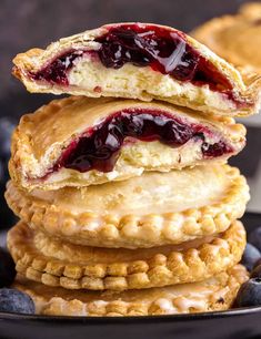 blueberry cheesecake cookies stacked on top of each other