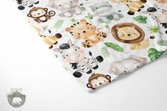 a close up of a blanket with animals on it