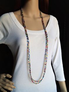 "Very long multi colored glass beads and flower beads necklace. 4 mm glass lustered beads. Tibetan style metal flower beads. The necklace is 87\", can be worn in many styles. Ready to ship in a gift bag. Thanks for looking and have a nice day! Follow me on the Facebook to see the newest listings and offers: https://www.facebook.com/Olga-Simon-Craft-Page-1685733831659641/ and Pinterest https://www.pinterest.com/olgas0322/lucky-knitter-on-etsy/" Flower Beads Necklace, Boho Necklaces, Stone Necklace Set, Long Necklace Boho, Multi Coloured Necklaces, Women Flower, Hippie Necklace, Gift For Woman, Bohemian Necklace