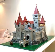 a castle made out of legos sitting on top of a table