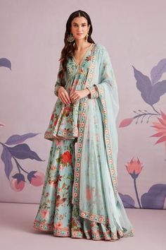 Sea green short anarkali with floral printed motifs, beaded embroidered yoke. Paired with printed gharara and net dupatta.
Component: 3
Pattern: Printed
Type Of Work: Floral Motifs
Neckline: V-neck
Sleeve Type: Straight Full
Fabric: Anarkali, Gharara: Silk; Dupatta: Net
Color: Green
Other Details: 
Embroidered yoke 
Occasion: Mehendi and Haldi - Aza Fashions Ridhi Mehra, Design Kurta, Sharara Suit, Indian Lehenga, Indian Clothes, Indian Designer Outfits, Indian Fashion Dresses, Kurta Designs, Sea Green