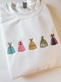 This Gender-Neutral Adult Tops & Tees item by JollyHolidayEmb has 2921 favorites from Etsy shoppers. Ships from Lebanon, TN. Listed on Jan 1, 2024 Disney Cricut Shirts, Disney Embroidery Designs, Disney Merch, Disney Embroidery, Disney Etsy, Disney Gift