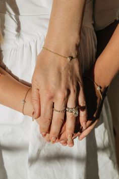 An heirloom diamond heart bracelet symbolizing true love. Each piece is hand-cast and handset in 14k solid yellow, white, or rose gold. Approximately .20 carat weight of high quality, round, brilliant diamonds in each heart (G color & VS clarity white diamonds). The Italian-milled chain is dainty, yet extremely durable. Adjustable length allows for a range of sizes and should fit most wrists. Adult/Mama Sizing: 6'' - 6.75'' max length Custom lengths and additional links are available free of cha Wedding Jewelry With Heart Charm In Cubic Zirconia, Cubic Zirconia Heart Charm Jewelry For Wedding, Wedding Jewelry With Cubic Zirconia Heart Charm, Adjustable Diamond Jewelry For Valentine's Day, White Gold Diamond Heart Bracelet For Wedding, Valentine's Day Adjustable Diamond Jewelry, Adjustable Diamond Heart Bracelet For Valentine's Day, Diamond Heart Bracelet For Wedding, Adjustable Heart-shaped Diamond Jewelry