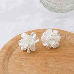 This Pair Of Floral Earrings In A Wonderful Addition To Your Wardrobe And Your Style! This Unique Piece Is Sure To Get Lots Of Compliments! A Great Piece With Any Outfit For Any Occasion! Chic White Flower-shaped Earrings, White Feminine Earrings With Flower Decoration, Chic White Flower Earrings For Wedding, White Flower Decoration Feminine Earrings, Chic White Flower Wedding Earrings, Elegant Adjustable Earrings With Flower Decoration, Elegant Earrings With Flower Decoration And Adjustable Fit, White Flower Earrings For Party, White Flower Decorated Earrings For Parties