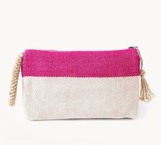 Add relaxed sophistication to your outfit with this soft jute clutch with macrame handle and tassled zipper closure. Measures 8” tall x 13” wide x 2.25” deep. Handmade by Fair Trade artisans each clutch is unique with slight variations in design, color, and size. To keep your clutch looking its best, simply wipe clean with a damp cloth and avoid exposing it to direct sunlight to prevent fading. Boho Clutch, Jute Fabric, Handmade Clutch, Pink Clutch, Pink Boho, Handmade Artisan, Clutch Purse, Daily Outfits, Accent Colors