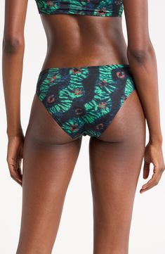 A eye-catching pattern brings sunny flair to these classic hipster bikini bottoms. Moderate back coverage Lined 80% polyamide, 20% elastane Hand wash, dry flat Made in Portugal Printed Tie-side Beachwear Bottoms, Multicolor Seamless Bottoms For Summer, Beachwear Elastane Beach Bottoms, Printed Stretch Bottoms For Poolside, Stretch Printed Bottoms For Poolside, Beach Season Elastane Bottoms, Printed Elastane Swimwear For Beach, Summer Tie-side Swimwear, Elastane Tie-side Swimming Bottoms