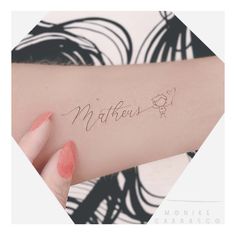 a woman's arm with the word mother written in cursive writing on it