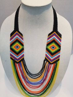 This thick necklace is made of fine multilayer beads wound together. It is very comfortable to wear and stays put around the neck. The beads are very bright and beautiful. Contact owner for any personalization. Thanks for vising my shop and come again. Stay safe https://www.etsy.com/shop/naistumityujewelry Unique Multicolor Double Strand Necklace, Multicolor Double Strand Beaded Chain Necklace, Multicolor Double Strand Layered Necklace With Beaded Chain, Multicolor Beaded Multi-strand Layered Necklace, Double Strand Polished Bead Necklaces, Multicolor Double Strand Layered Necklace, Traditional Multi-strand Beaded Necklaces, Layered Necklace With Colorful Round Beads For Gifts, Adjustable Multicolor Necklace With 108 Beads