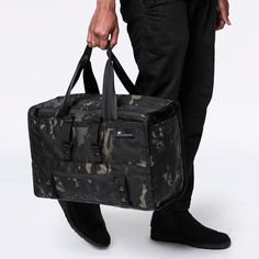 Black Camo Weatherproof 31L Duffle bag by Mission Workshop Rectangular Nylon Duffle Bag For Outdoor, Durable Military Black Bags, Durable Black Military Bags, Waterproof Nylon Weekender Bag For Outdoor Activities, Nylon Weekender Bag With Zipper For Outdoor Activities, Durable Rectangular Duffle Bag For Outdoor, Durable Rectangular Outdoor Duffle Bag, Outdoor Durable Rectangular Duffle Bag, Military Style Nylon Bags For Everyday Use