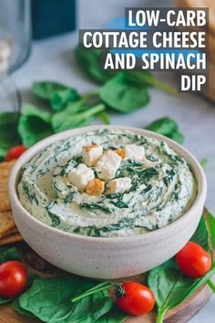 Low-carb cottage cheese and spinach dip in a bowl, garnished with crumbled cheese, surrounded by tomatoes and crackers. Cottage Cheese Cheesecake Dip, Cottage Cheese Veggie Dip, Keto Cottage Cheese Recipes, Healthy Party Dips, Spinach And Cottage Cheese, Spinach Cottage Cheese, Cottage Cheese Dip