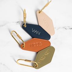 - Embossed Diamond Leather Keychain w/ Gold Key FOB - Includes personalization (up to 8 letters) - 4 leather colors to choose from - Terracotta, Navy, Matcha, Cream - 4 foil embossing options - Blind Embossing (No Color), Gold, Rose Gold, Silver - Production takes approx. 3-5 business days & shipping speed can be selected upon checkout Our Hand-Embossed Leather Keychain is uniquely shaped in an elegant diamond design and paired with a stunning Gold Key FOB. Choose from a palette of five distinct leather colors to match your style, and further customize with a choice of blind embossing, gold, silver, or rose gold foil for a truly individualized key chain. Diamond Keychain, Matcha Cream, Blind Embossing, Custom Cufflinks, Planner Business, Leather Colors, Hanger Design, Keychain Fob, Gold Key