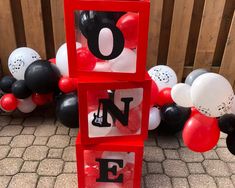 the letters are made out of blocks and balloons