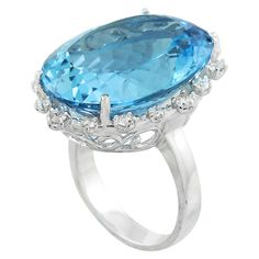 Stamped: 14K Total Ring Weight: 7.2 Grams Topaz Weight 33.57 Carat (22.75x18.00 Millimeters)Diamond Weight: 0.55 carat (F-G Color, VS2-SI1 Clarity )Face Measures: 27.90x21.50 Millimeter SKU: [600818] Elegant Formal Topaz Ring With 17 Jewels, Luxury Blue Topaz Diamond Ring For Formal Occasions, Elegant Blue Topaz Diamond Ring For Formal Occasions, Luxury Formal Blue Topaz Diamond Ring, Luxury Formal Topaz Ring With Gemstone, Elegant Formal Rings With Blue Topaz, Luxury Formal Topaz Gemstone Ring, Luxury Formal Topaz Ring, Elegant Formal Blue Topaz Rings