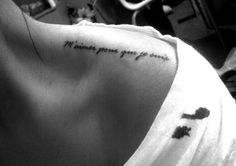 the back of a woman's shoulder with an inscription on it that says, i love