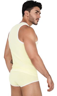 Sporty Sleeveless Tank Top With Contrast Trim, White Color Block Sleeveless Tank Top, White Sleeveless Color Block Tank Top, Color Block Stretch Sleeveless Top, Stretch Sleeveless Top With Contrast Color, Sleeveless Stretch Top With Contrast Color, Casual Sleeveless Top With Contrast Color, Yellow Color Block Sleeveless Top, Sporty Tank Top With Contrast Trim