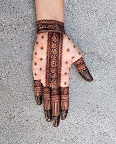 a henna on someone's hand is shown