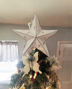 a christmas tree with a star hanging from the top