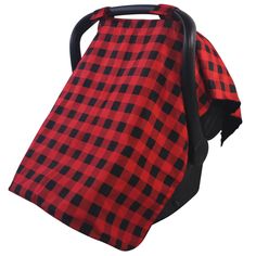 a red and black checkered blanket on the back of a stroller seat cover