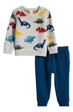 This darling ensemble pairs a patterned sweater with coordinating knit pants for an adorable look any time of year. Includes sweater and pants Top is 100% cotton; bottoms are 58% cotton, 37% polyester, 5% spandex Machine wash, tumble dry Imported Toddler Boy Sweater, Dinosaur Sweater, Elastic Waistband Pants, Infant Boys, Dinosaur Design, Boys Sweaters, Boys Jacket, Sweater Pants