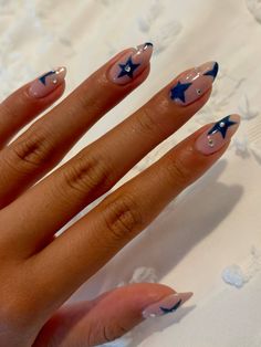 Almond Nail Designs With Gems, Navy Swirl Nails, Gem Star Nails, Nails With Stars And Gems, Navy Almond Nails Design, Homecoming Nails Navy Blue, Navy Nails Stars, Blue And Silver Star Nails, Navy Blue Nails Stars