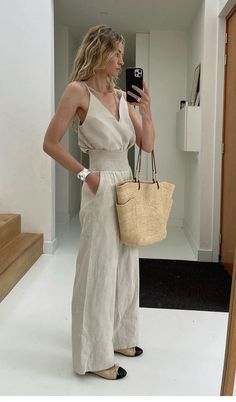 Classy casual summer holidays outfit. #beigejumpsuit #holidaysoutfit #selfie #mirrorselfie #mirror #homedecor #chanel #chanelshoes #chanelballet #beigebag #summerbag #blonde #balayage #summerhair #beigeaesthetic #chic #elegant #beige #ootd #wiwt #beigeoutfit #monochromatic #summer #summeroutfit #style #fashion #luxury #photo #pinterest #elegantoutfit #cleangirl #oldmoney #aesthetic Beige Linen Pants, Spain Outfit, Anouk Yve, Linen Pants Outfit, Resort Dress, Light Knit Sweater, Feminine Shoes, Outfits To Wear, Breezy Dress