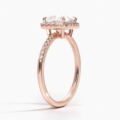 Princess Cut Cambria Halo Diamond Engagement Ring - 14K Rose Gold. This glittering halo ring features delicate pavé diamonds that encircle the center gem and adorn the band. An open gallery makes this ring light and feminine for a truly special look (1/5 total carat weight). Princess Cut Diamond Ring Gold, Anniversary Halo Ring With Radiant Cut, Dazzling Halo Setting Ring For Proposal, Radiant Cut Halo Setting Ring For Anniversary, Radiant Cut Halo Setting Wedding Ring For Proposal, Radiant Cut Halo Setting Ring For Proposal, Dazzling Radiant Cut Halo Ring, Wedding Cluster Ring With Halo Setting And Lab-grown Diamond, Luxury Lab Grown Diamond Ring With Halo Setting