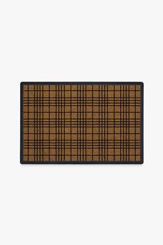 a brown and black plaid rug on a white background