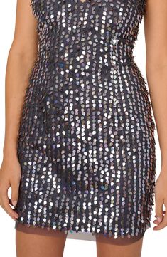 If a disco ball was a dress, this would be it. 34 1/2" length Hidden back-zip closure V-neck V-back Sleeveless Lined 100% polyester Spot clean Imported Metallic Embellished Sequin Dress For Night Out, Metallic Embellished Sequin Dress For Cocktail, Disco Style Sleeveless Embellished Mini Dress, Disco Style Embellished Sequin Cocktail Dress, Sleeveless Embellished Disco Dress, Glamorous Sleeveless Sequin Dress With Back Zipper, Sleeveless Disco Embellished Dress, Metallic Sequin Sleeveless Evening Dress, Metallic Sleeveless Sequin Disco Dress