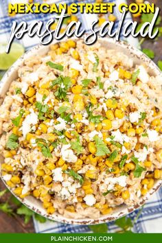 mexican street corn salad with feta cheese and cilantro in a white bowl