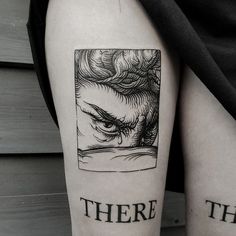 there is a tattoo on the leg of a woman