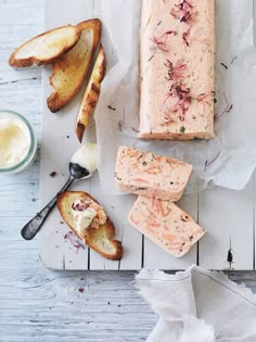 bread, butter and other food items on a table