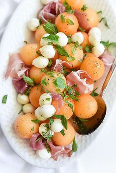 a white plate topped with lots of food