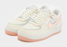 Refresh your crep game with these women's Air Force 1 Shadow sneakers from Nike. In a Coconut Milk and Crimson Tint colourway, these sneaks are cut from smooth durable leather for a lasting wear. They feature a lace fastening to lock you in, with a padded collar for support. Underfoot, they sit on a chunky foam midsole that combines with a Nike Air unit for a smooth ride, with a grippy rubber outsole for traction. Finished up with classic Swoosh branding. Grey Nike Air Force 1, Nike Air Force 1 Shadow, Nike React Vision, 270 Nike, Air Force 1 Shadow, Football Training, Football Kits, Grey Nikes, Football Boots